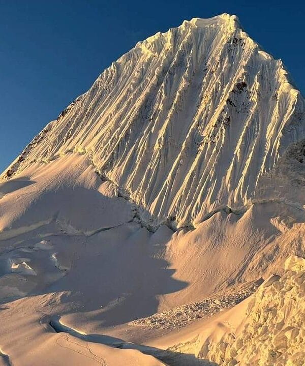 Technical snow and ice climbing on Alpamayo Mountain in the Cordillera Blanca