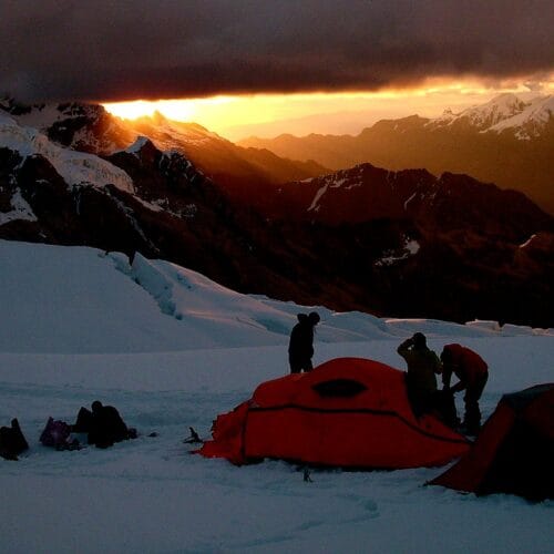 Climbers crossing glacier terrain during an Alpamayo climbing expedition from Huaraz