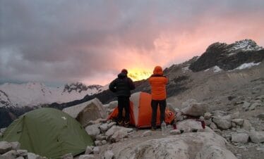 Technical ice climbing on Alpamayo west face with certified mountain guides