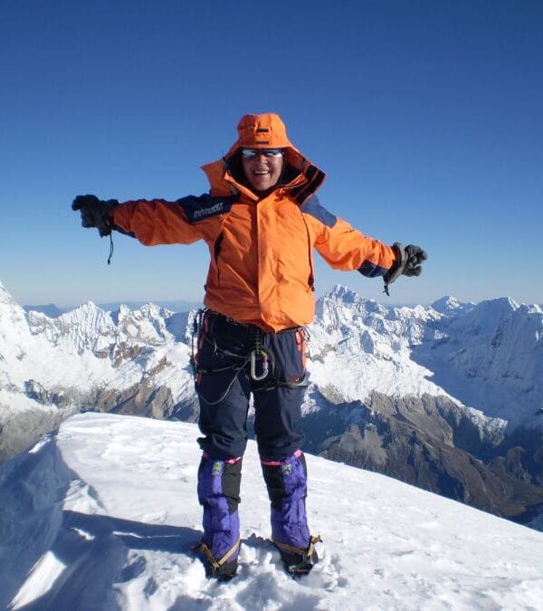 Climbers roped on snow slopes of Chopicalqui peak