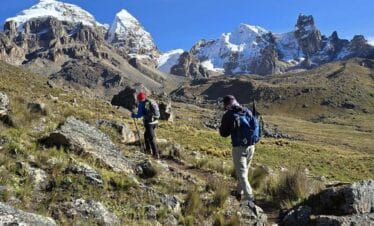Hikers ascending Cuyoc Pass on the Huayhuash Complete Circuit