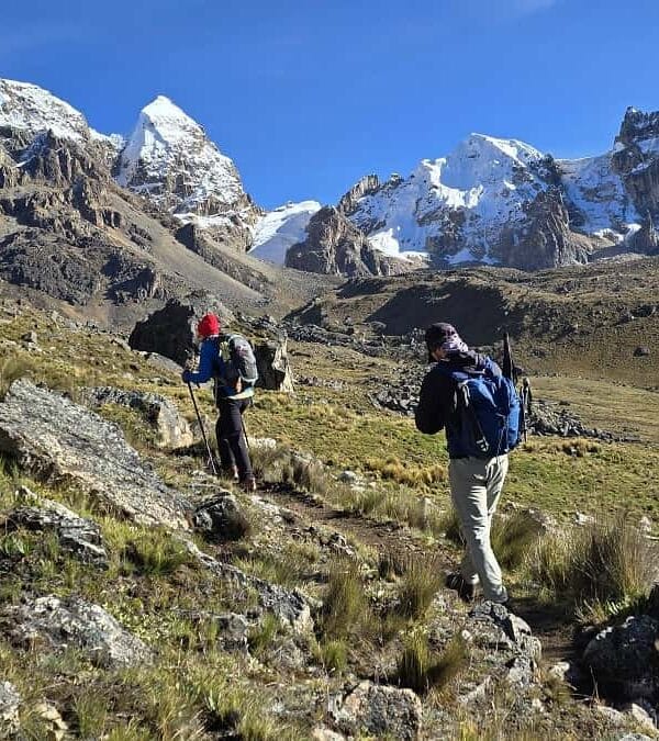 Hikers ascending Cuyoc Pass on the Huayhuash Complete Circuit