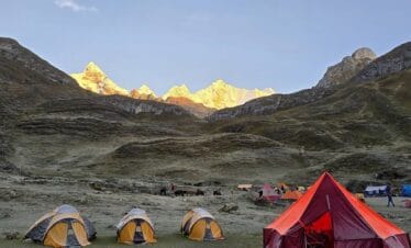 Sunset view over Jahuacocha Lake during the Huayhuash Trek Classic in the Cordillera Huayhuash