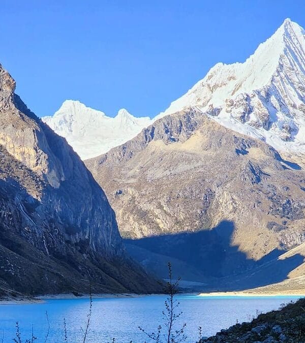Laguna Paron Tour Cordillera Blanca surrounded by Artesonraju and Piramide de Garcilaso