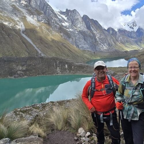 Trekkers approaching Siula Pass in the Cordillera Huayhuash