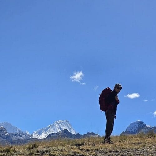 Hikers walking natural ridges during Dos Wankas hike Peru